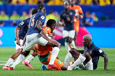 Players compete for the ball during the World Cup Group E soccer match between Ivory Coast and Ecuador in Philadelphia, Sunday, June 14, 2026.