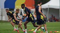 AP Photo : Members of the Sweden national soccer warm up during a training session in Santiago Nuevo Leon, Mexico.