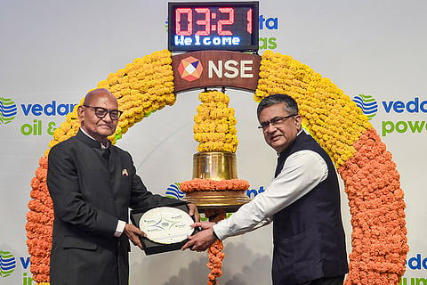 National Stock Exchange (NSE) CEO Ashishkumar Chauhan and Vedanta Group Chairman Anil Agarwal during the NSE closing bell ceremony, marking the listing of four newly demerged companies on Indian stock exchanges, in Mumbai.
