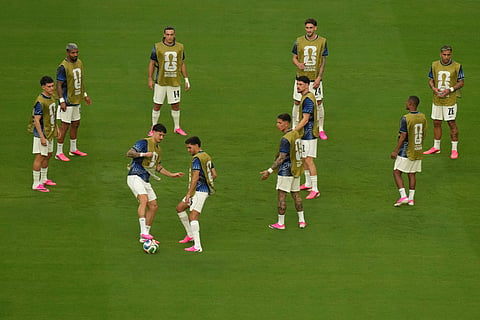 Uruguay players warm up before the World Cup Group H soccer match between Saudi Arabia and Uruguay in Miami Gardens, Fla., Monday, June 15, 2026.