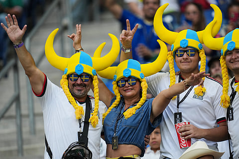 Fans react ahead of the World Cup Group F soccer match between Sweden and Tunisia in Guadalupe, near Monterrey, Mexico, Sunday, June 14, 2026.