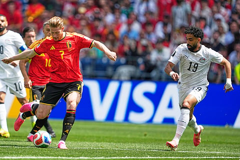 Belgium's Kevin De Bruyne, left, controls the ball chased by Egypt's Marawan Attia during the World Cup Group G soccer match in Seattle, Monday, June 15, 2026.