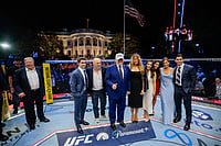 (Evan Vucci/Pool Photo via AP) : President Donald Trump, first lady Melania Trump, UFC President and CEO Dana White and other guests pose inside the octagon after UFC Freedom 250 on the South Lawn of the White House, Monday, June 15, 2026, in Washington. 