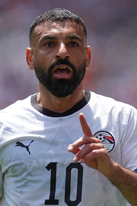 Egypt's Mohamed Salah gestures as he speaks to his teammates during the World Cup Group G soccer match between Belgium and Egypt in Seattle, Monday, June 15, 2026.