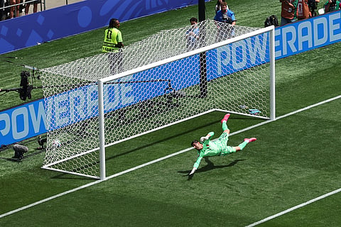 Belgium goalkeeper Thibaut Courtois (1) lets the ball slip past for a goal during the World Cup Group G soccer match between Belgium and Egypt in Seattle, Monday, June 15, 2026.