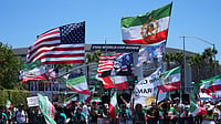 FIFA World Cup 2026: Iranian Americans Plan Protests And Watch Parties Ahead Of Team's Opener AP Photo : People protest outside Los Angeles Stadium before the World Cup Group G soccer match between Iran and New Zealand in Inglewood, Calif., near Los Angeles.
