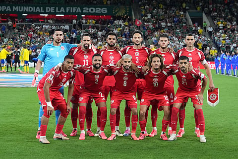 Tunisia players pose for a team photo ahead of the World Cup Group F soccer match between Sweden and Tunisia in Guadalupe, near Monterrey, Mexico, Sunday, June 14, 2026.