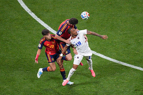 Spain's Aymeric Laporte (14) and Cape Verde's Dailon Livramento (19) go up for a header during the World Cup Group H soccer match between Spain and Cape Verde in Atlanta, Monday, June 15, 2026.