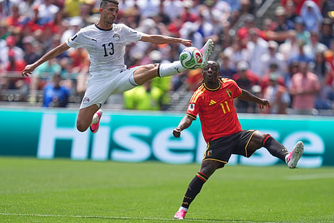 Egypt's Ahmed Fatouh attempts to control the ball as Belgium's Jeremy Doku looks on during the World Cup Group G soccer match between Belgium and Egypt in Seattle, Monday, June 15, 2026.