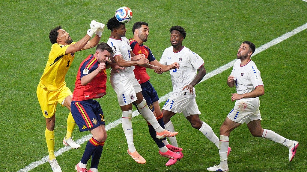 Cape Verde's Kevin Pina (6) heads the ball against Spain's Aymeric Laporte (14) during the World Cup Group H soccer match between Spain and Cape Verde in Atlanta. - AP Photo