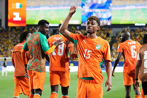 Ivory Coast's Amad Diallo (15) gestures to fans after scoring his team's first goal during the World Cup Group E soccer match between Ivory Coast and Ecuador in Philadelphia, Sunday, June 14, 2026.