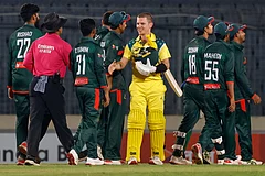 Australia's Adam Zampa, centre, shake hands with Bangladesh cricketers at the ten of the third one day international cricket match between Australia and Bangladesh, in Mirpur, Bangladesh. - | Photo: AP/Mosaraf Hossain