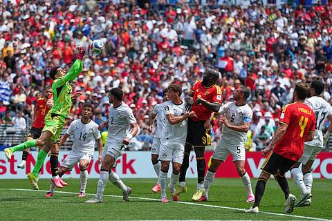 Egypt's goalkeeper Mostafa Shoubir, left, rises to punch the ball clear during the World Cup Group G soccer match between Belgium and Egypt in Seattle, Monday, June 15, 2026.