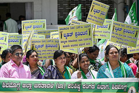 JD(S) members stage a protest rally against the Congress government over various demands, in Shivamogga, Karnataka.