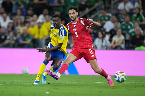 Sweden's Alexander Isak (9) scores the second goal against Tunisia's Montassar Talbi (3) during the World Cup Group F soccer match between Sweden and Tunisia in Guadalupe, near Monterrey, Mexico, Sunday, June 14, 2026.