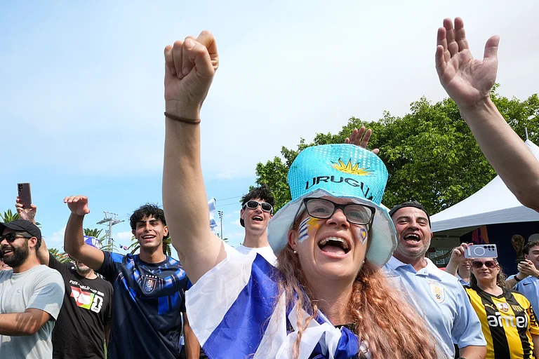 Fans cheer before the World Cup Group H soccer match between Saudi Arabia and Uruguay in Miami Gardens, Fla., Monday, June 15, 2026. - AP Photo/Marta Lavandier