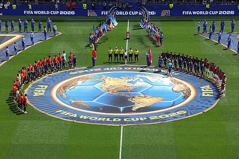 Players stand for the National anthem before the World Cup Group G soccer match between Belgium and Egypt in Seattle, Monday, June 15, 2026.