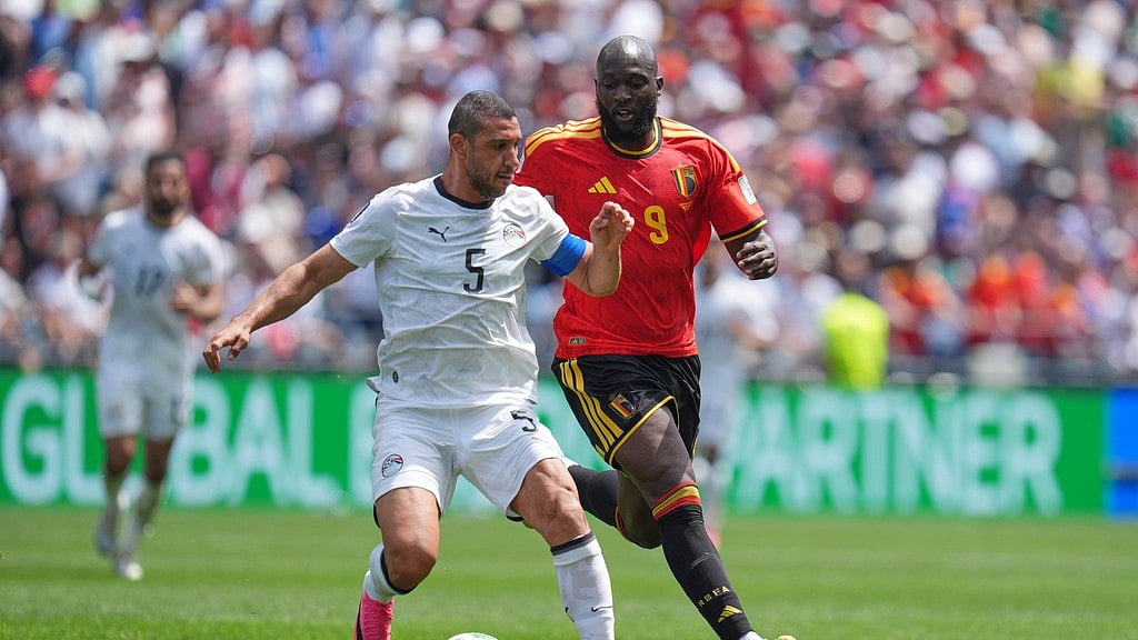 Egypt's Ramy Rabia. Left defends the ball from Belgium's Romelu Lukaku during the World Cup Group G soccer match between Belgium and Egypt in Seattle. - AP Photo