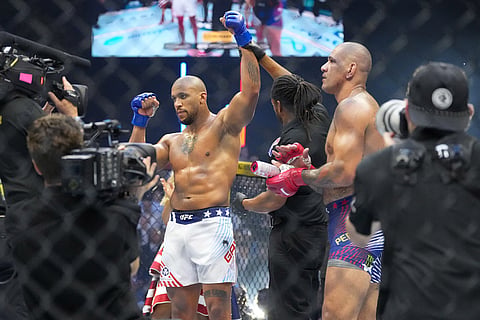 Ciryl Gane wins the interim heavyweight title bout against Alex Pereira, right, at UFC Freedom 250 on the South Lawn of the White House in Washington.
