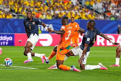 Ivory Coast's Ghislain Konan (3) and Ecuador's Joel Ordonez (4) battle for the ball during the World Cup Group E soccer match between Ivory Coast and Ecuador in Philadelphia, Sunday, June 14, 2026.