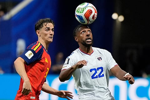 Cape Verde's Steven Moreira, right, heads the ball as Spain's Gavi looks on during the World Cup Group H soccer match between Spain and Cape Verde in Atlanta, Monday, June 15, 2026.