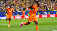AP Photo : Ivory Coast's Yan Diomande (11) celebrates after teammate Amad Diallo scored their first goal during the World Cup Group E soccer match between Ivory Coast and Ecuador in Philadelphia.
