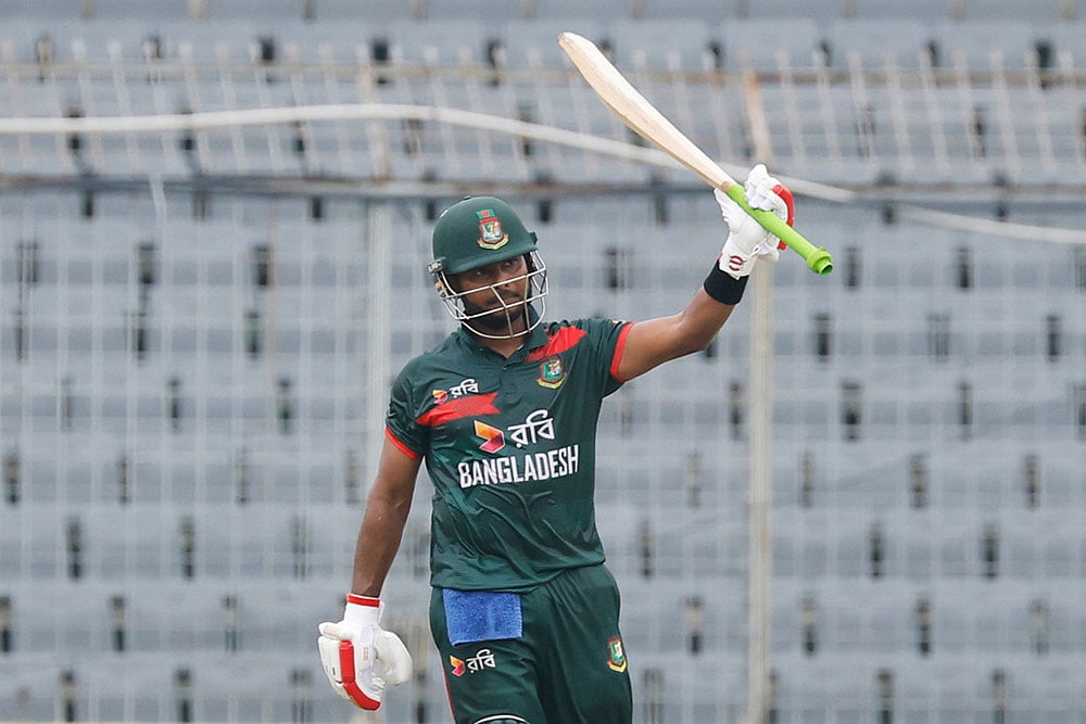 Bangladeshs Mosaddek Hossain celebrates his fifty runs