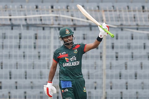 Bangladesh's Mosaddek Hossain celebrates his fifty runs during the third one day international cricket match between Australia and Bangladesh, in Mirpur, Bangladesh.