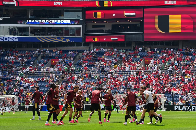 The Belgian team take part in the warm up ahead pf the World Cup Group G soccer match between Belgium and Egypt in Seattle - AP Photo