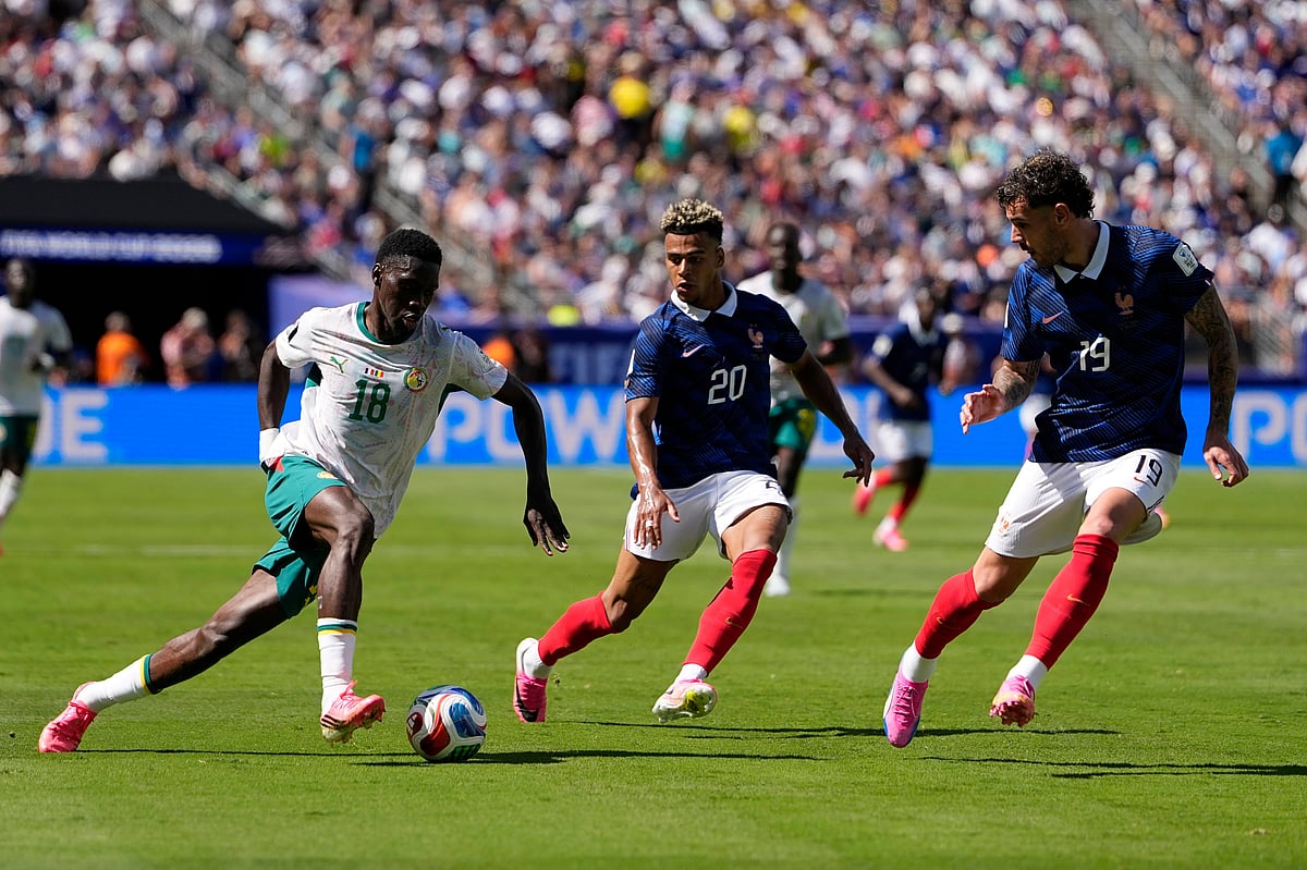 France Vs Senegal FIFA World Cup 2026 Group I Ismaila Sarr goes past Desire Doue AP Photo