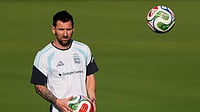 | Photo: AP/Charlie Riedel : Argentina's Lionel Messi practices for the FIFA World Cup soccer tournament in Kansas City, Kansas.