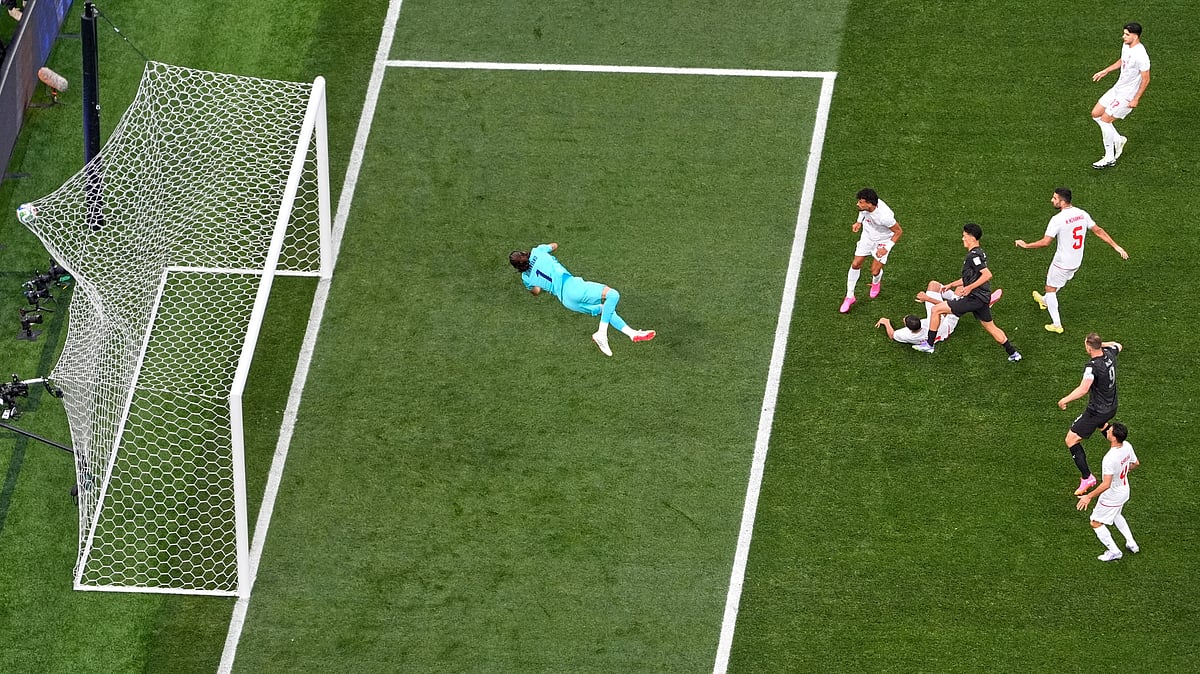 New Zealand's Elijah Just (11), center, scores their opening goal during the World Cup Group G soccer match between Iran and New Zealand in Inglewood, Calif., near Los Angeles, Monday, June 15, 2026 - (AP Photo/Mark J. Terrill)