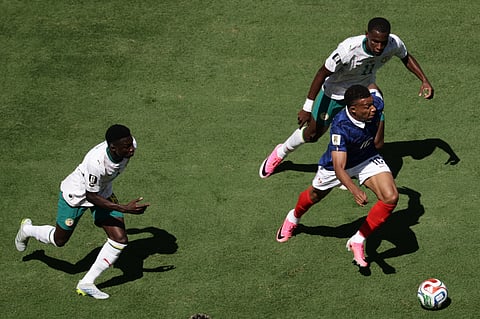 France's Kylian Mbappe in action during the World Cup Group I soccer match between France and Senegal in East Rutherford, N.J., near New York, Tuesday, June 16, 2026.