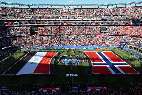 Players stand for the National Anthem during the World Cup Group I soccer match between Iraq and Norway in Foxborough, Mass., near Boston, Tuesday, June 16, 2026.