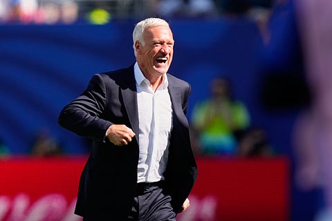 France head coach Didier Deschamps celebrates after France's Bradley Barcola scores his side's second goal during the World Cup Group I soccer match between France and Senegal in East Rutherford, N.J., near New York, Tuesday, June 16, 2026.
