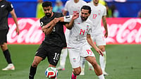 Who Is Sarpreet Singh? Meet The Indian-Origin Midfielder Representing New Zealand At FIFA World Cup 2026 (AP Photo/Mark J. Terrill) : New Zealand's Sarpreet Singh (10) battles for the ball with Iran's Saman Ghoddos (14) during the World Cup Group G soccer match between Iran and New Zealand in Inglewood, Calif., near Los Angeles, Monday, June 15, 2026