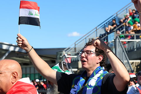 An Iraq fan cheers before the World Cup Group I soccer match between Iraq and Norway in Foxborough, Mass., near Boston, Tuesday, June 16, 2026.