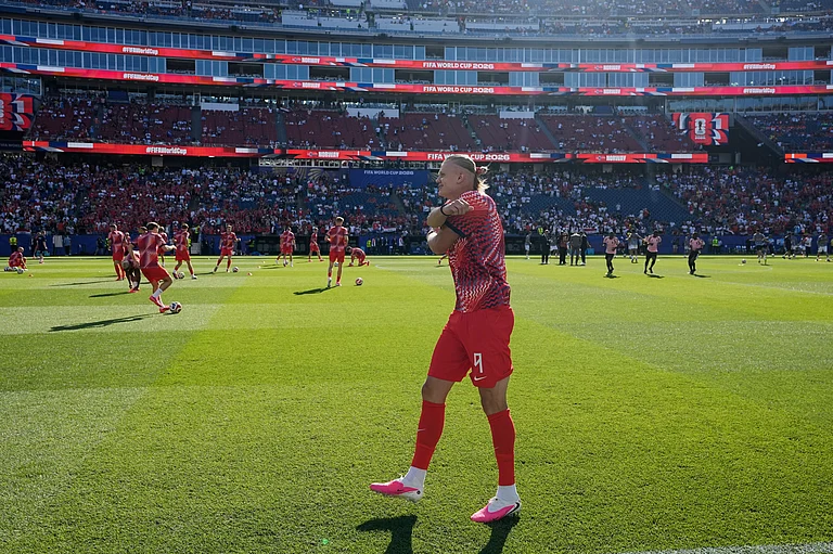 Norway's Erling Haaland warms up prior to the World Cup Group I soccer match. - AP/Martin Meissner