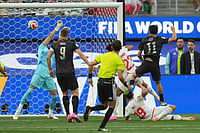 AP Photo/Andre Penner : New Zealand's Elijah Just (11) scores the opening goal during the World Cup Group G soccer match between Iran and New Zealand in Inglewood, Calif., near Los Angeles, Monday, June 15, 2026.