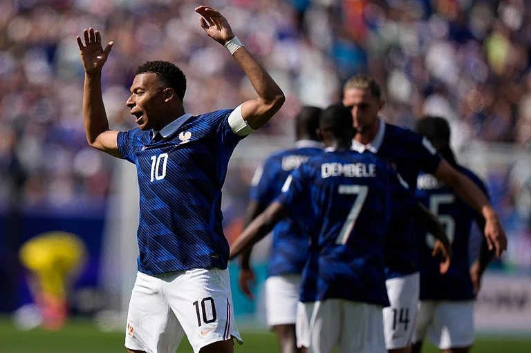 France's Kylian Mbappe celebrates after scoring the opening goal of his team during the World Cup Group I soccer match between France and Senegal in East Rutherford, N.J., near New York, Tuesday, June 16, 2026. - AP Photo/Frank Franklin II