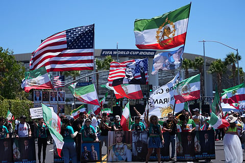 People protest outside Los Angeles Stadium before the World Cup Group G soccer match between Iran and New Zealand in Inglewood, Calif., near Los Angeles, Monday, June 15, 2026.