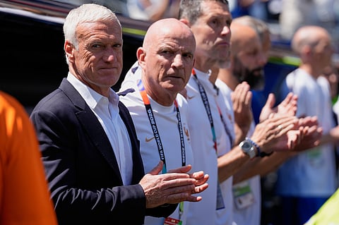 France head coach Didier Deschamps, left, and staff look on during the World Cup Group I soccer match between France and Senegal in East Rutherford, N.J., near New York, Tuesday, June 16, 2026.