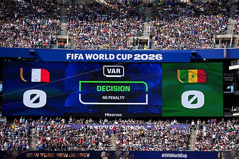 The screen shows a VAR decision during the World Cup Group I soccer match between France and Senegal in East Rutherford, N.J., near New York, Tuesday, June 16, 2026.