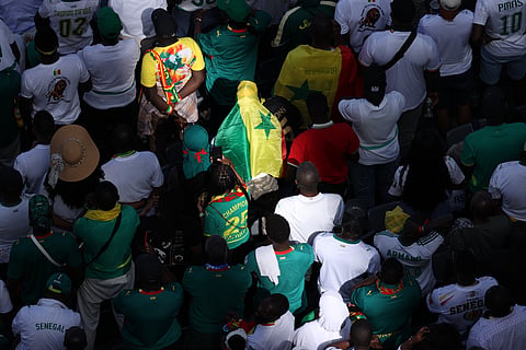 Senegal fans sit during the World Cup Group I soccer match between France and Senegal in East Rutherford, N.J., near New York, Tuesday, June 16, 2026.