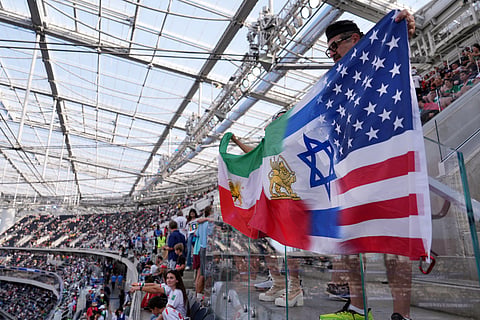 Fans cheer inside the stadium before the World Cup Group G soccer match between Iran and New Zealand in Inglewood, Calif., near Los Angeles, Monday, June 15, 2026.
