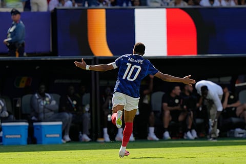 France's Kylian Mbappe (10) celebrates after scoring their third goal during the World Cup Group I soccer match between France and Senegal in East Rutherford, N.J., near New York, Tuesday, June 16, 2026.