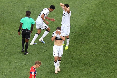 Iraq's Akam Hashim (5) and Zaid Ismael (24) reacts to a missed goal at the end of the first half during the World Cup Group I soccer match between Iraq and Norway in Foxborough, Mass., near Boston, Tuesday, June 16, 2026.