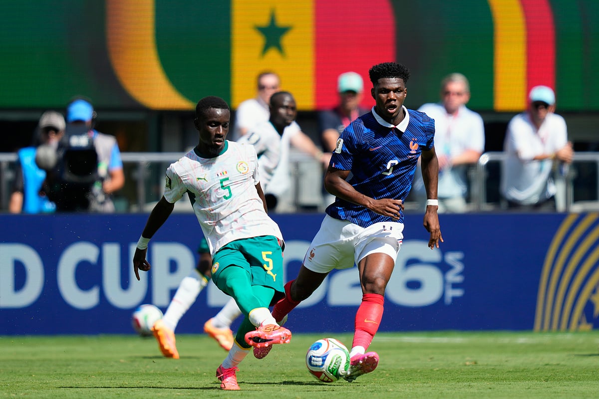 Senegal's Idrissa Gana Gueye passes the ball in front of France's Aurelien Tchouameni, right, during the World Cup Group I soccer match between France and Senegal in East Rutherford, N.J., near New York, Tuesday, June 16, 2026. - AP Photo/Yuki Iwamura