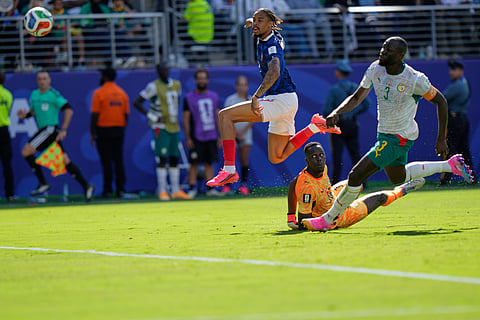 France's Bradley Barcola (12) scores his side's second goal during the World Cup Group I soccer match between France and Senegal in East Rutherford, N.J., near New York, Tuesday, June 16, 2026.