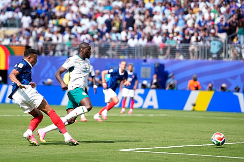 France's Kylian Mbappe scores the opening goal of his team during the World Cup Group I soccer match between France and Senegal in East Rutherford, N.J., near New York, Tuesday, June 16, 2026.